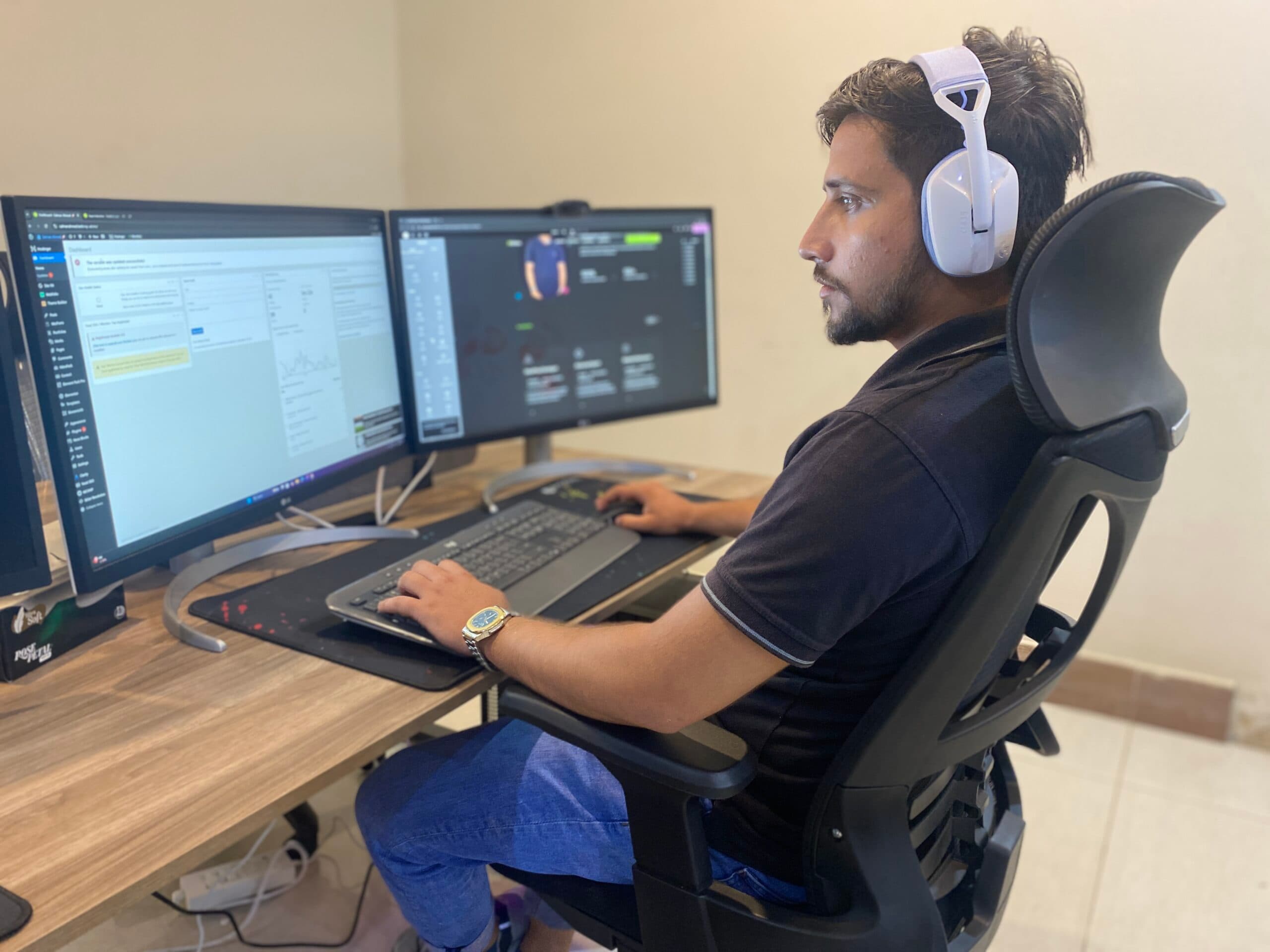 Salman Ahmed at his workstation