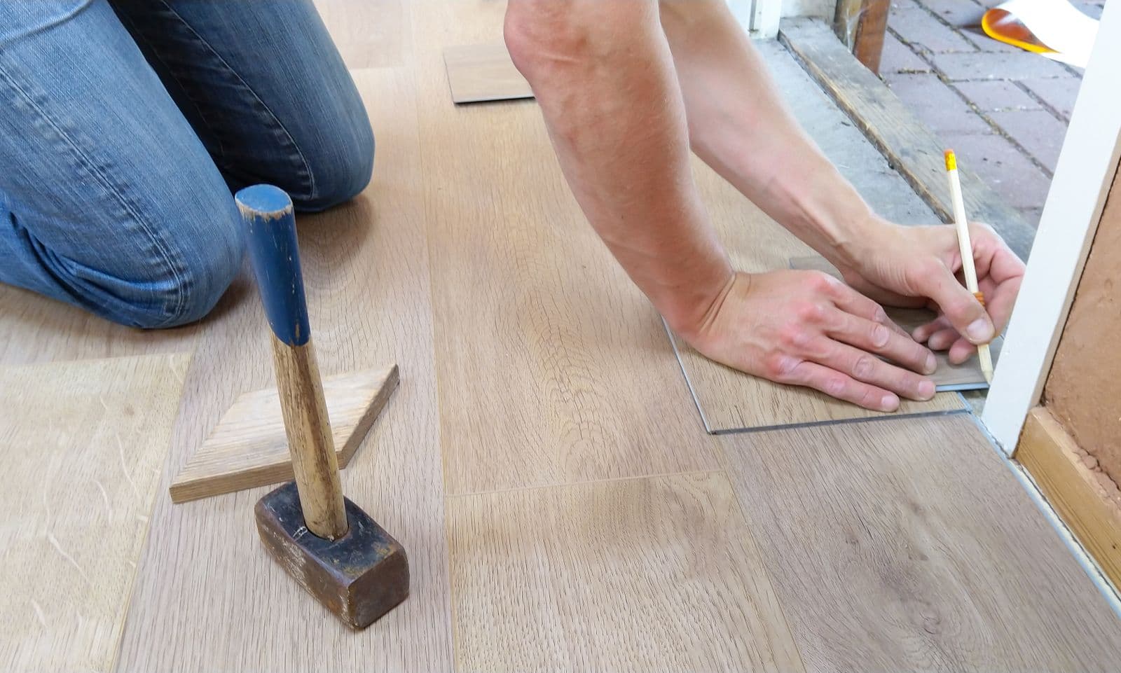 WordPress website design for contractors — hardwood flooring installation in progress
